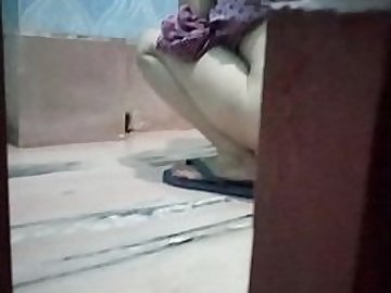 desi bhabi pissing and naughty son using his mobile quickly to take the video hiddenly