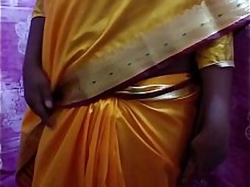 Desi Hot Girl Showing Her Assets Stripping In Saree